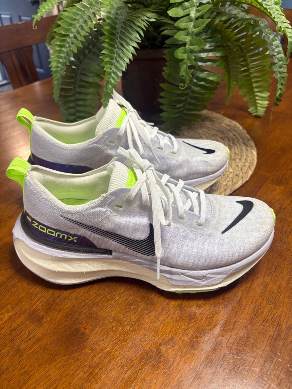 Nike White Running Shoes with Black Swoosh and Neon Green Accents